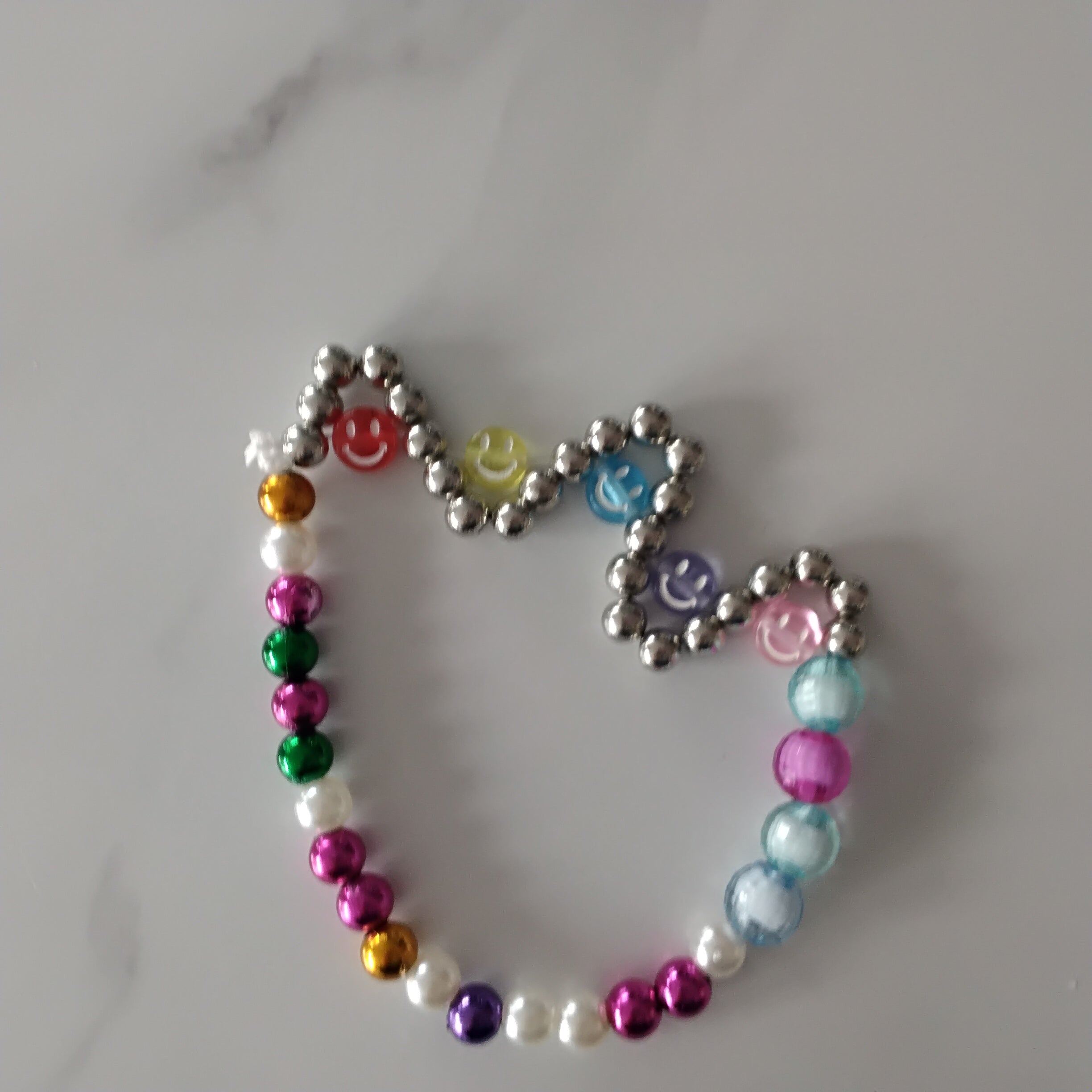 Preppy smiles wave bracelet with pearls