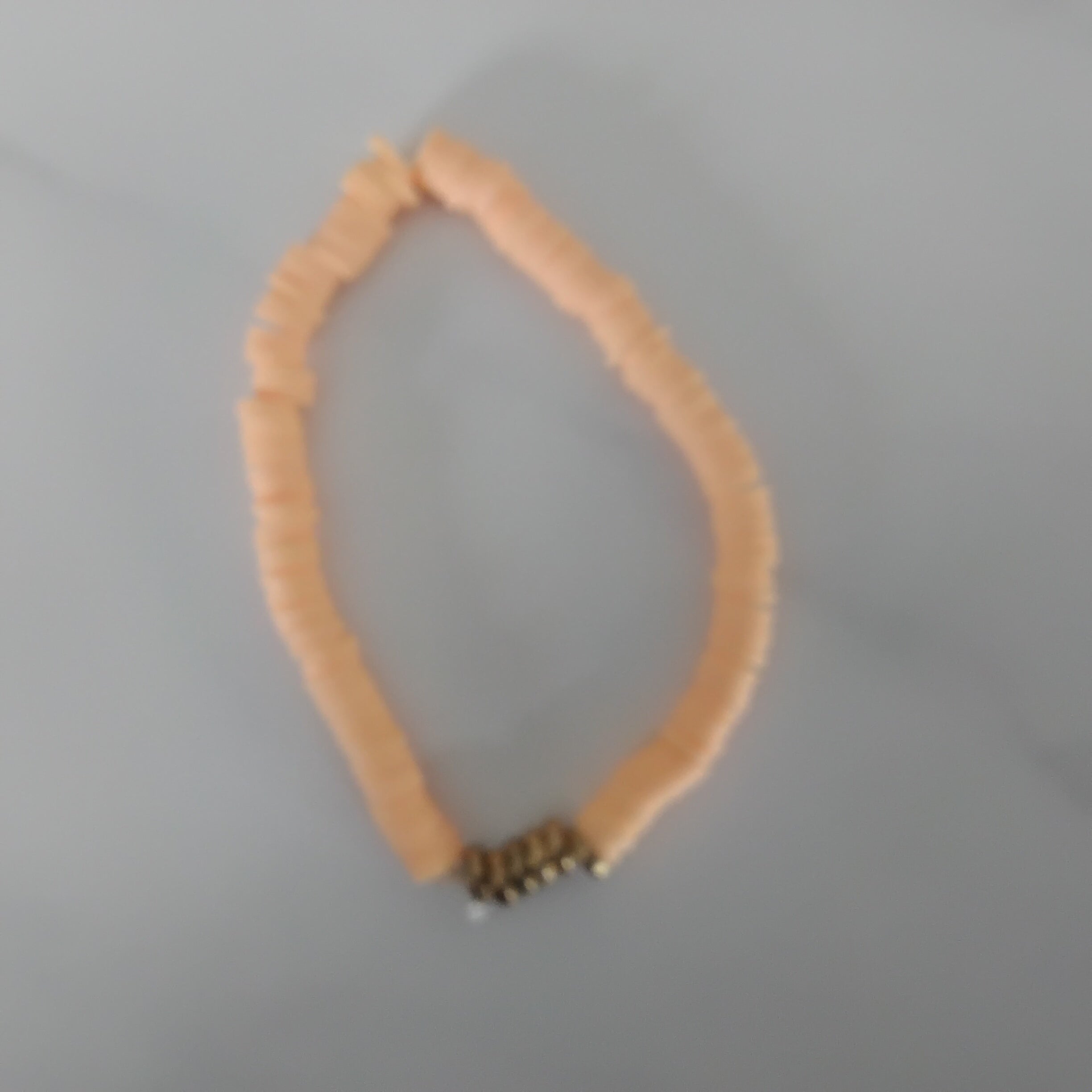 Orange with gold clay bead bracelet