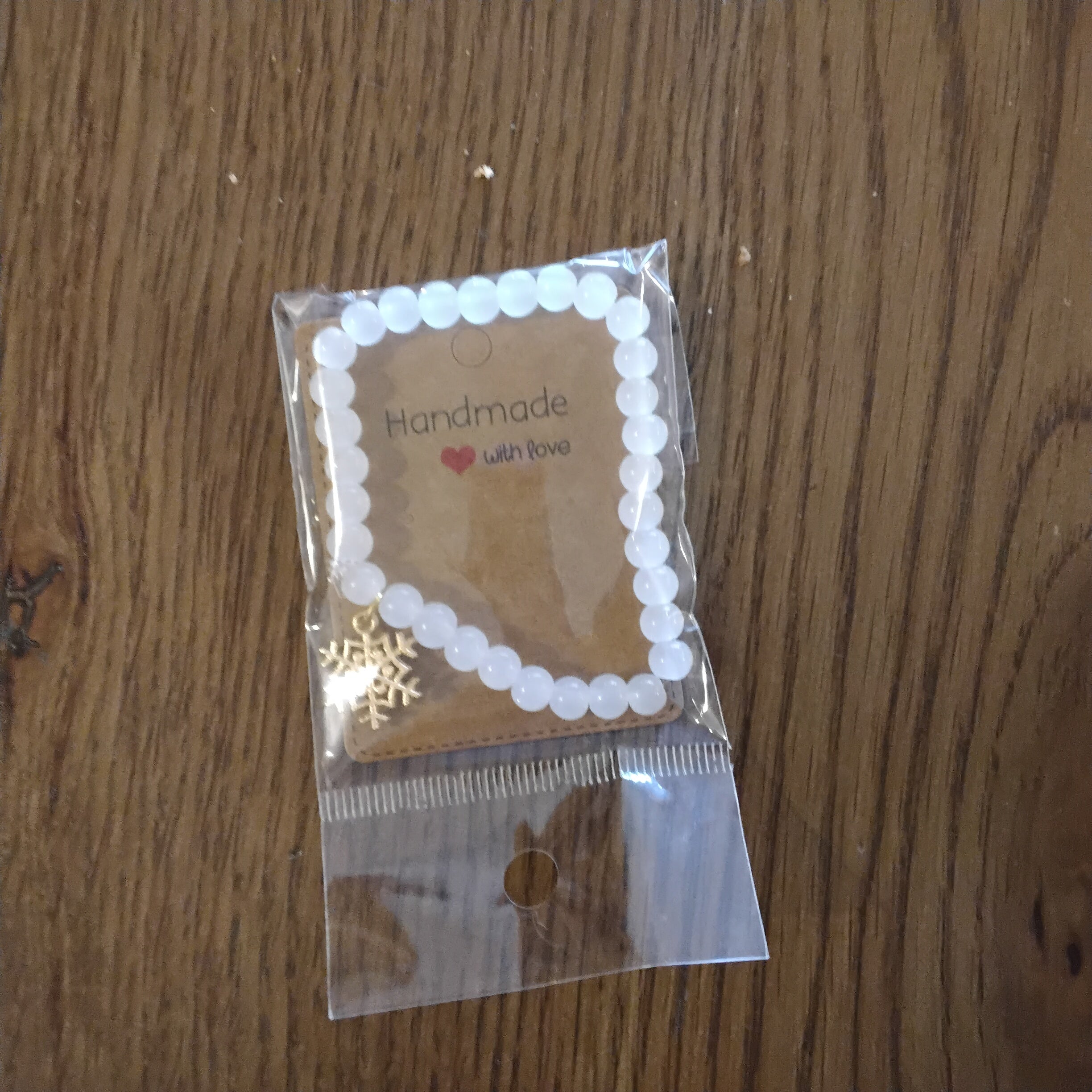 Glass bead bracelet with snowflake