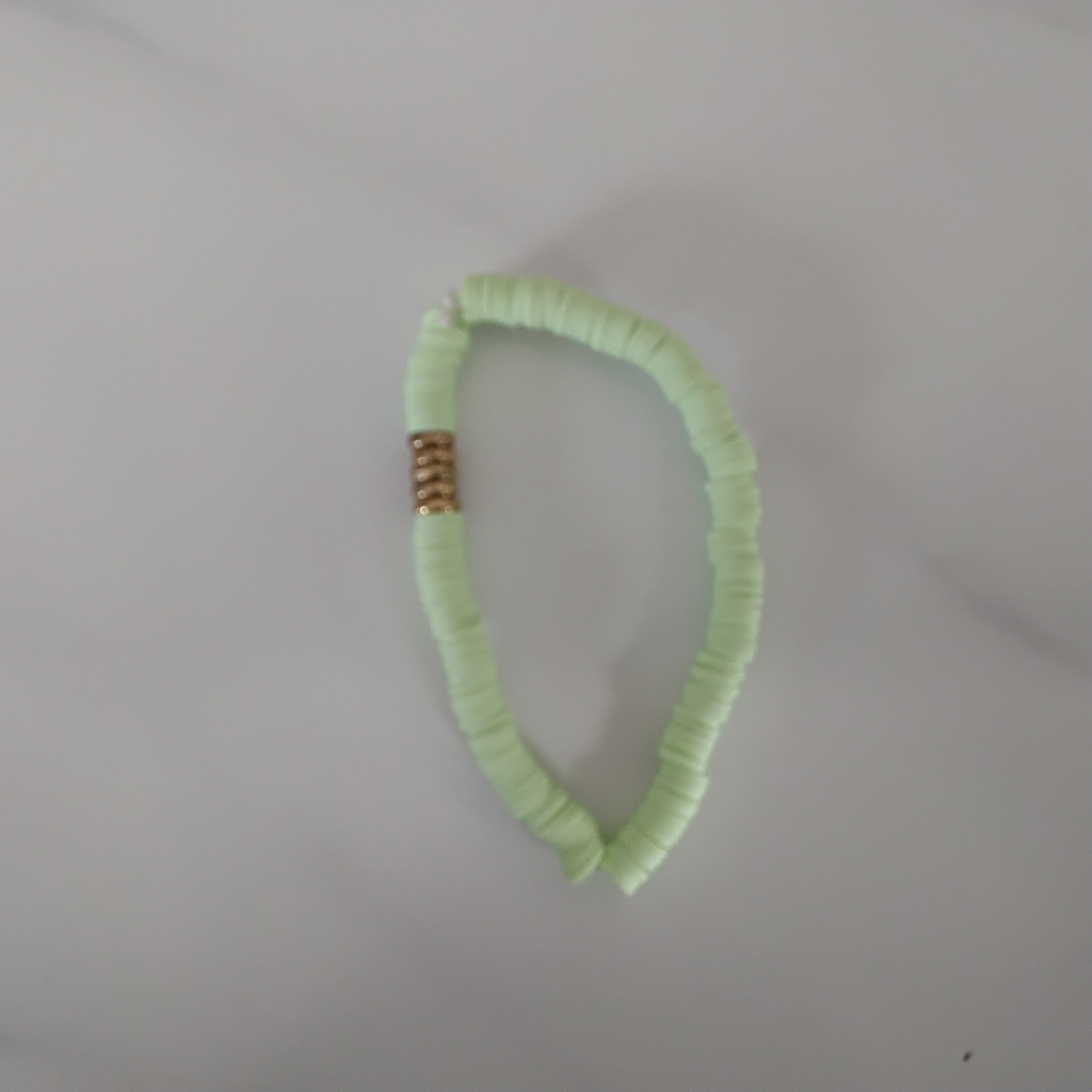 Green with gold clay bead bracelet