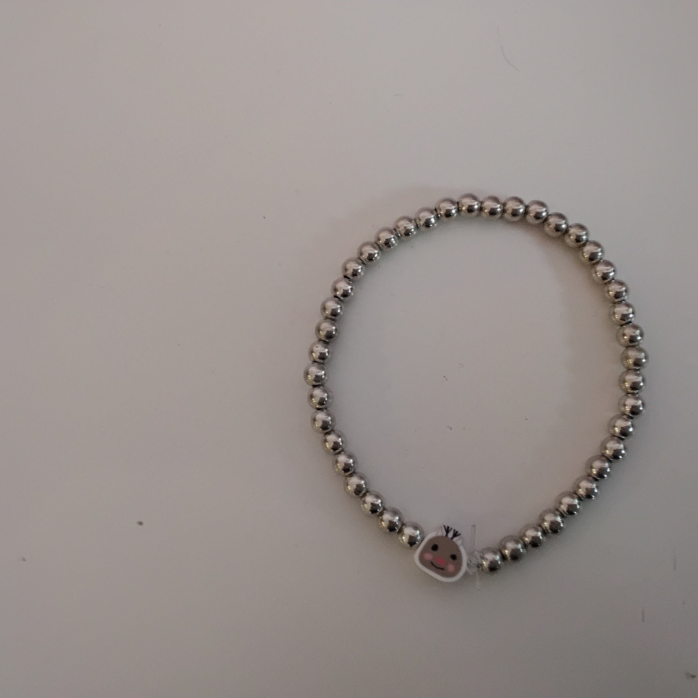 Sliver pearls with a reindeer charm bracelet