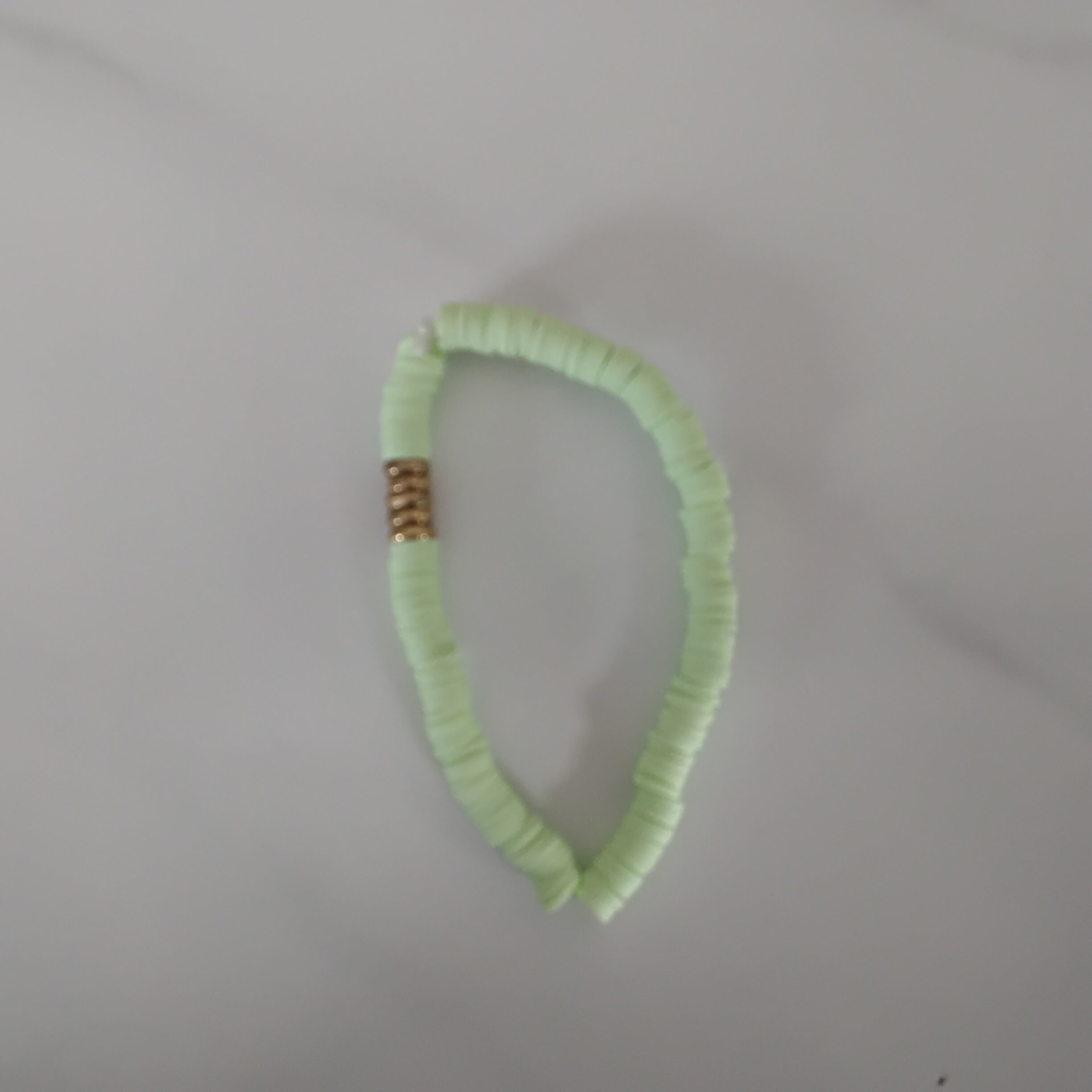 Green with gold clay bead bracelet