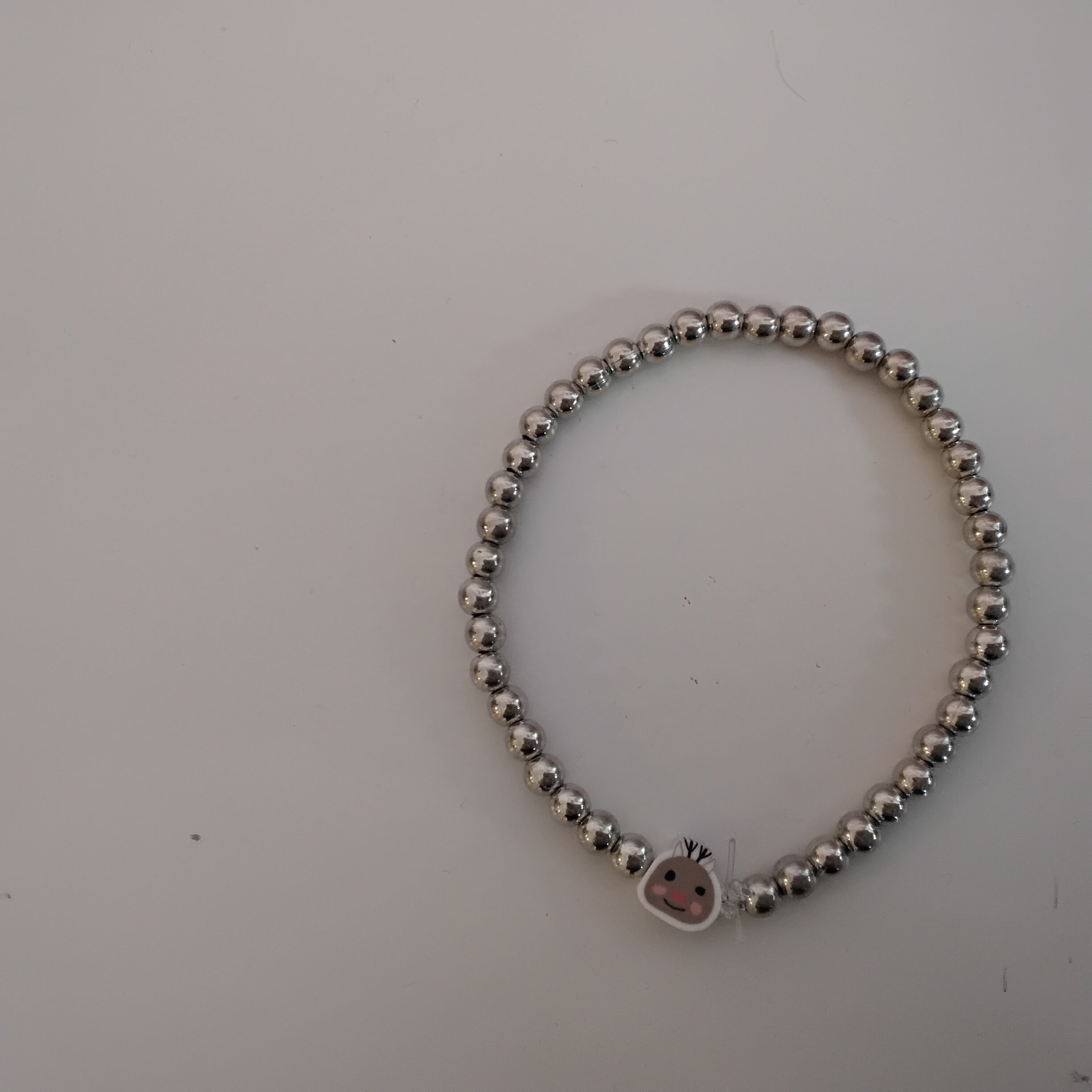 Sliver pearls with a reindeer charm bracelet